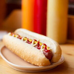 hotdog sandwich on white plate